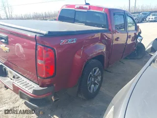 2019 Chevrolet Colorado 4WD Z71 with VIN 1GCGTDEN0K1115177, listed as a IAAI auction lot 41775785 with 48,825 mi miles. Bid and sale history available at carsss.com. Image 4.