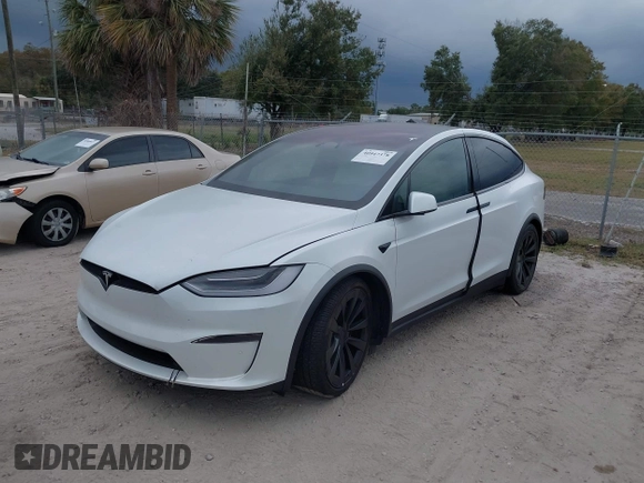 2022 Tesla Model X with VIN 7SAXCBE56NF364067, listed as a IAAI auction lot 40947378 with Not Provided miles and . Bid and sale history available at DreamBid. Image 2.