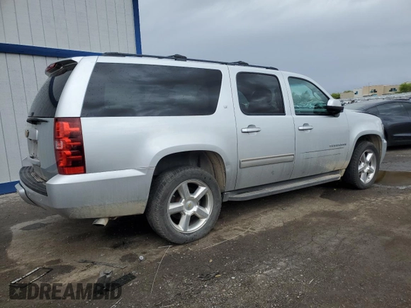 2013 Chevrolet Suburban LT with VIN 1GNSCJE07DR305437, listed as a Copart auction lot 55346605 with 160,518 mi miles and Salvage title. Bid and sale history available at DreamBid. Image 3.