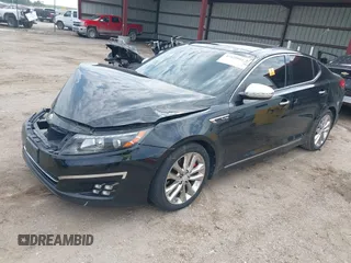 2014 Kia Optima SX Turbo with VIN 5XXGR4A65EG276131, listed as a IAAI auction lot 42429004 with 136,766 mi miles and . Bid and sale history available at DreamBid. Image 17.