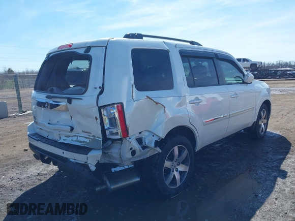 2013 Honda Pilot Touring with VIN 5FNYF3H9XDB006353, listed as a IAAI auction lot 41826557 with 174,552 mi miles and . Bid and sale history available at DreamBid. Image 6.