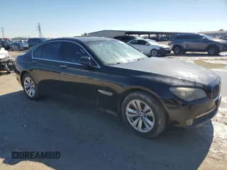 2012 BMW 7 Series 740i with VIN WBAKA4C52CDS99036, listed as a Copart auction lot 88492615 with Not provided miles and Salvage title. Bid and sale history available at DreamBid. Image 4.