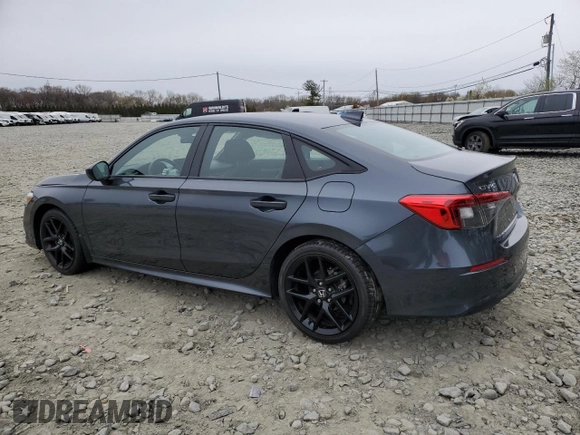 2023 Honda Civic Sport z VIN 2HGFE2F50PH556908, wystawiony jako Copart lot #52789655 z przebiegiem Nie podano mil oraz Szkoda całkowita • Salvage title. Historia ofert i sprzedaży dostępna na DreamBid. Obrazek 2.