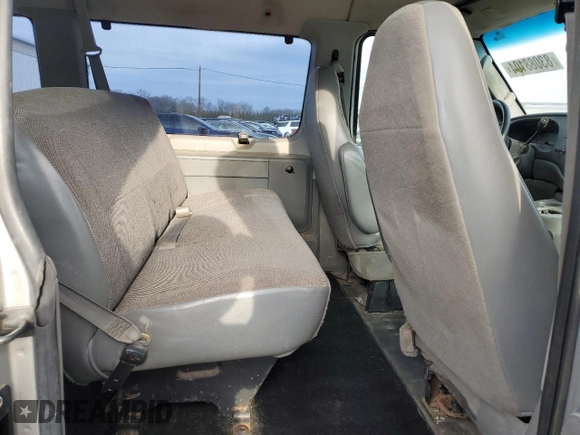 2004 Ford Econoline Passenger XL with VIN 1FMRE11W54HB15178, listed as a Copart auction lot 83088104 with 248,516 mi miles and Salvage Title. Bid and sale history available at DreamBid. Image 11.