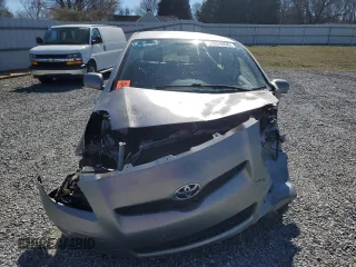 2011 Toyota Yaris with VIN JTDJT4K37B5340908, listed as a Copart auction lot 47574995 with 0 mi miles and Salvage Title. Bid and sale history available at carsss.com. Image 5.
