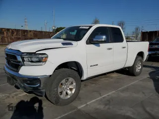 2020 Ram 1500 Laramie with VIN 1C6SRFDT0LN253615, listed as a Copart auction lot 49910145 with 77,895 mi miles and Salvage Title. Bid and sale history available at carsss.com. Image 1.