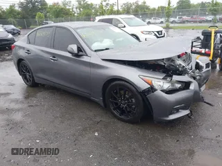 2015 Infiniti Q50 Premium z VIN JN1BV7APXFM358127, wystawiony jako IAAI lot #42364173 z przebiegiem 97 512 mil mil oraz . Historia ofert i sprzedaży dostępna na DreamBid. Obrazek 1.