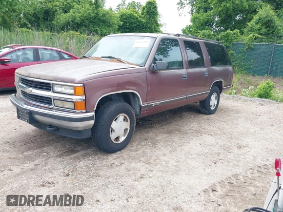 1996 Chevrolet Suburban z VIN 1GNFK16R8TJ397396, wystawiony jako IAAI lot #42367280 z przebiegiem 287 980 mil mil oraz . Historia ofert i sprzedaży dostępna na DreamBid. Obrazek 2.