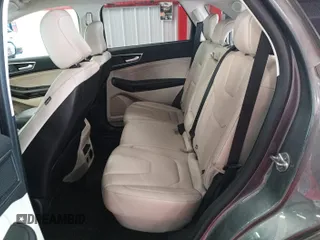 2021 Ford Edge Titanium with VIN 2FMPK4K95MBA50355, listed as a IAAI auction lot 42821253 with 109,191 mi miles and . Bid and sale history available at DreamBid. Image 29.