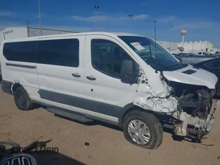 2016 Ford Transit XL z VIN 1FBZX2YM0GKB08269, wystawiony jako IAAI lot #41814059 z przebiegiem 70 556 mil mil oraz . Historia ofert i sprzedaży dostępna na DreamBid. Obrazek 14.