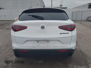 2020 Alfa Romeo Stelvio Sport z VIN ZASPAJAN3L7C94007, wystawiony jako IAAI lot #41606766 z przebiegiem Nie podano mil oraz . Historia ofert i sprzedaży dostępna na DreamBid. Obrazek 17.