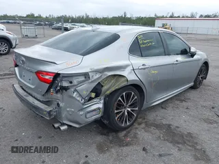 2019 Toyota Camry LE z VIN 4T1B11HK9KU708465, wystawiony jako IAAI lot #41921754 z przebiegiem 119 106 mil mil oraz . Historia ofert i sprzedaży dostępna na DreamBid. Obrazek 4.