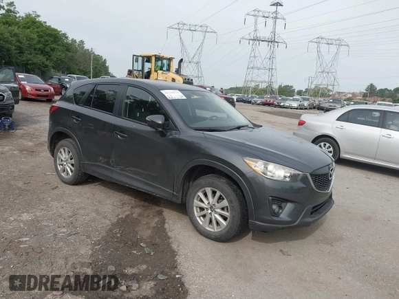 2014 Mazda CX-5 Touring z VIN JM3KE4CY2E0348500, wystawiony jako IAAI lot #42318155 z przebiegiem 182 616 mil mil oraz . Historia ofert i sprzedaży dostępna na DreamBid. Obrazek 1.