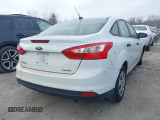 2013 Ford Focus S with VIN 1FADP3E20DL332636, listed as a IAAI auction lot 40917274 with 112,956 mi miles. Bid and sale history available at carsss.com. Image 4.