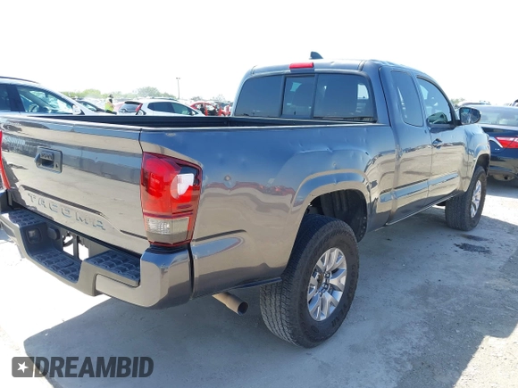 2020 Toyota Tacoma SR with VIN 3TYRX5GNXLT002488, listed as a IAAI auction lot 41973584 with 76,169 mi miles and . Bid and sale history available at DreamBid. Image 4.