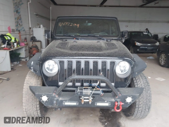 2021 Jeep Wrangler Unlimited Rubicon with VIN 1C4HJXFN2MW587168, listed as a IAAI auction lot 42472309 with 66,272 mi miles and . Bid and sale history available at DreamBid. Image 12.