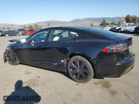 2022 Tesla Model S with VIN 5YJSA1E59NF460010, listed as a Copart auction lot 42797455 with Not provided miles and Salvage title. Bid and sale history available at DreamBid. Image 2.