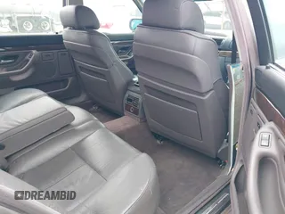 1998 BMW 7 Series 740il with VIN WBAGJ8323WDM23239, listed as a IAAI auction lot 41512630 with 221,673 mi miles. Bid and sale history available at carsss.com. Image 8.