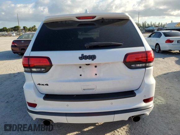 2018 Jeep Grand Cherokee Overland z VIN 1C4RJFCT1JC502125, wystawiony jako Copart lot #61613274 z przebiegiem 59 692 mil mil oraz Nie do naprawy • Non repairable. Historia ofert i sprzedaży dostępna na DreamBid. Obrazek 6.