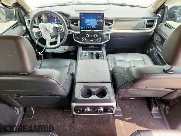 2022 Ford Expedition Max XLT z VIN 1FMJK1HT8NEA62920, wystawiony jako Copart lot #57080095 z przebiegiem 25 632 mil mil oraz Szkoda całkowita • Salvage title. Historia ofert i sprzedaży dostępna na DreamBid. Obrazek 7.