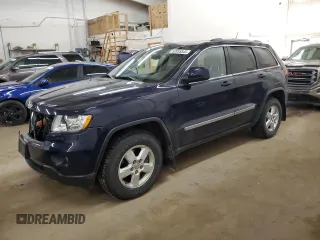 2012 Jeep Grand Cherokee Laredo with VIN 1C4RJFAG9CC221229, listed as a Copart auction lot 52035545 with 70,332 mi miles and Salvage Title. Bid and sale history available at carsss.com. Image 1.