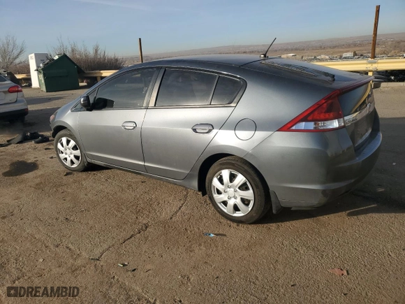 2013 Honda Insight LX with VIN JHMZE2H57DS001000, listed as a Copart auction lot 85597514 with 104,458 mi miles and Salvage Title. Bid and sale history available at carsss.com. Image 2.