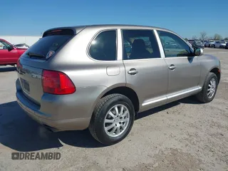 2005 Porsche Cayenne with VIN WP1AA29P75LA24751, listed as a IAAI auction lot 41837622 with 138,912 mi miles. Bid and sale history available at carsss.com. Image 4.