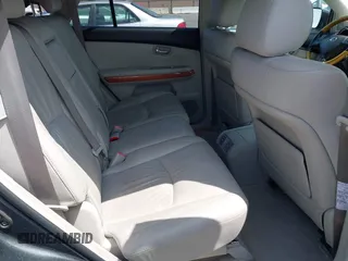 2007 Lexus RX 400h with VIN JTJGW31U372001817, listed as a IAAI auction lot 42047143 with 155,767 mi miles and . Bid and sale history available at DreamBid. Image 8.