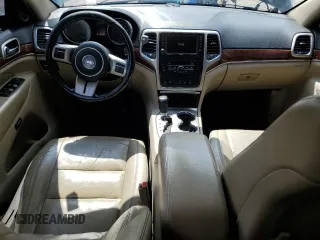 2011 Jeep Grand Cherokee Limited with VIN 1J4RR5GT4BC619724, listed as a Copart auction lot 63989905 with 212,198 mi miles and Clean title. Bid and sale history available at DreamBid. Image 8.