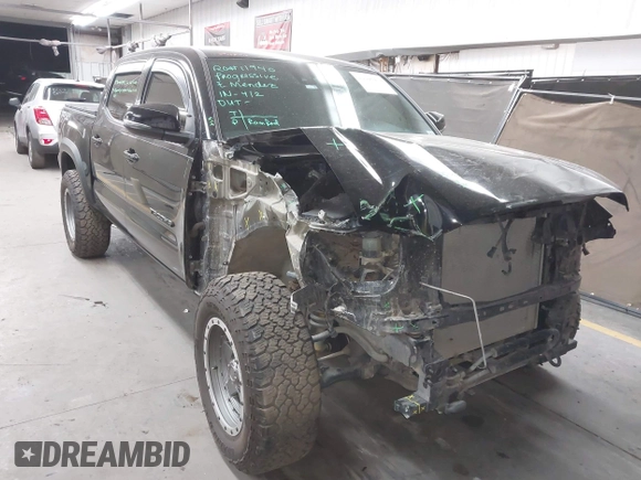 2021 Toyota Tacoma SR with VIN 3TMCZ5AN4MM448304, listed as a IAAI auction lot 42046932 with 56,161 mi miles and . Bid and sale history available at DreamBid. Image 1.