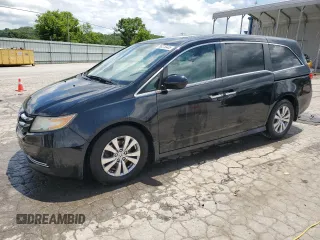 2014 Honda Odyssey EX-L with VIN 5FNRL5H67EB129303, listed as a Copart auction lot 59276445 with 210,128 mi miles and Salvage title. Bid and sale history available at DreamBid. Image 1.