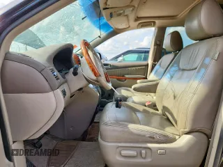 2009 Toyota Sienna XLE with VIN 5TDZK22C29S231769, listed as a Copart auction lot 64512415 with 182,637 mi miles and Clean title. Bid and sale history available at DreamBid. Image 7.