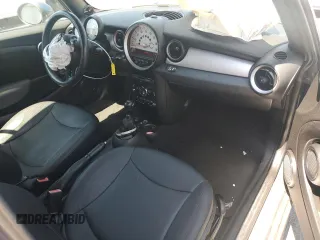 2011 MINI Convertible z VIN WMWZN3C56BTZ78387, wystawiony jako Copart lot #65002185 z przebiegiem 147 901 mil mil oraz Czysty tytuł • Clean title. Historia ofert i sprzedaży dostępna na DreamBid. Obrazek 8.
