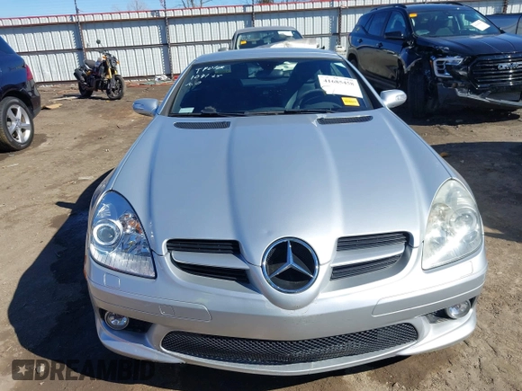 2005 Mercedes-Benz SLK 230/320 z VIN WDBWK56FX5F052512, wystawiony jako IAAI lot #41685458 z przebiegiem 46 186 mil mil oraz . Historia ofert i sprzedaży dostępna na DreamBid. Obrazek 12.