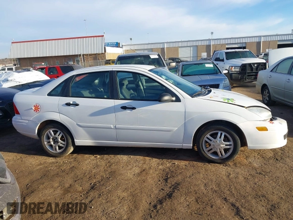 2004 Ford Focus SE with VIN 1FAFP34324W137459, listed as a IAAI auction lot 41634502 with 134,113 mi miles and . Bid and sale history available at DreamBid. Image 13.