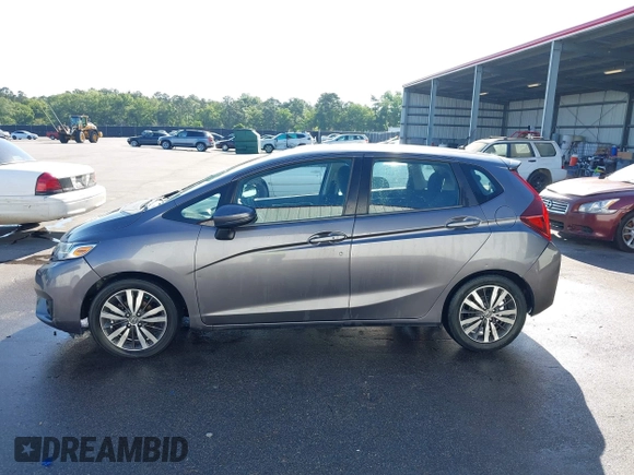 2015 Honda Fit EX-L with VIN 3HGGK5H89FM708786, listed as a IAAI auction lot 42132494 with 132,056 mi miles and . Bid and sale history available at DreamBid. Image 14.