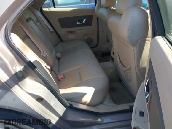 2006 Cadillac CTS z VIN 1G6DP577360126698, wystawiony jako IAAI lot #41666618 z przebiegiem 142 335 mil mil oraz . Historia ofert i sprzedaży dostępna na DreamBid. Obrazek 8.