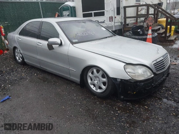 2001 Mercedes-Benz S-Class with VIN WDBNG75JX1A196406, listed as a IAAI auction lot 41682384 with 999,999 mi miles. Bid and sale history available at carsss.com. Image 1.