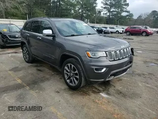 2017 Jeep Grand Cherokee Overland with VIN 1C4RJECG2HC903366, listed as a Copart auction lot 44140155 with 102,459 mi miles and Salvage title. Bid and sale history available at DreamBid. Image 12.