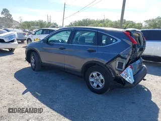 2013 Honda CR-V LX with VIN 3CZRM3H33DG702711, listed as a IAAI auction lot 41889747 with 132,937 mi miles. Bid and sale history available at carsss.com. Image 3.