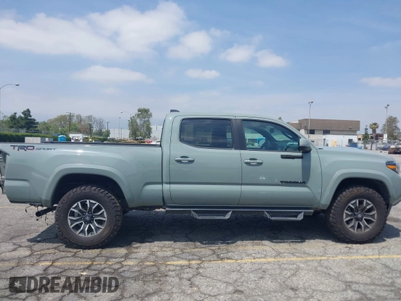 2022 Toyota Tacoma SR5 with VIN 3TMBZ5DN1NM035572, listed as a IAAI auction lot 42083925 with 82,596 mi miles and . Bid and sale history available at DreamBid. Image 14.