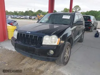 2005 Jeep Grand Cherokee Laredo with VIN 1J4HR48N75C647740, listed as a IAAI auction lot 41803160 with 145,147 mi miles. Bid and sale history available at carsss.com. Image 2.