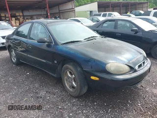 1999 Mercury Sable LS Premium Group z VIN 1MEFM53S7XA632876, wystawiony jako IAAI lot #42303137 z przebiegiem 178 617 mil mil oraz . Historia ofert i sprzedaży dostępna na DreamBid. Obrazek 1.
