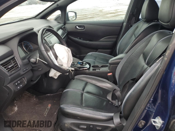 2018 Nissan LEAF S with VIN 1N4AZ1CP4JC305063, listed as a Copart auction lot 49671435 with 128,514 mi miles and Salvage Title. Bid and sale history available at DreamBid. Image 7.