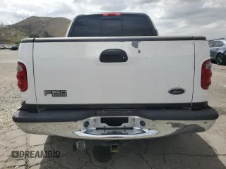 2002 Ford F-150 XLT with VIN 1FTRW07L52KA04929, listed as a Copart auction lot 54491815 with 169,132 mi miles and Salvage Title. Bid and sale history available at carsss.com. Image 6.