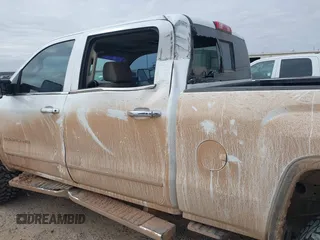 2015 GMC Sierra 2500HD available WiFi Denali with VIN 1GT120E84FF642823, listed as a IAAI auction lot 41593286 with 148,038 mi miles. Bid and sale history available at carsss.com. Image 6.