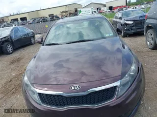 2011 Kia Optima LX with VIN KNAGM4A73B5063778, listed as a IAAI auction lot 39932051 with 143,175 mi miles. Bid and sale history available at carsss.com. Image 14.