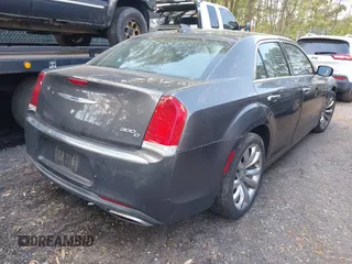2017 Chrysler 300 with VIN 2C3CCAEG2HH588009, listed as a IAAI auction lot 42035609 with 204,795 mi miles. Bid and sale history available at carsss.com. Image 4.