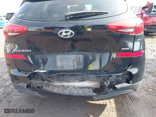 2019 Hyundai Tucson Value with VIN KM8J3CA41KU066384, listed as a IAAI auction lot 41524315 with 52,903 mi miles. Bid and sale history available at carsss.com. Image 6.