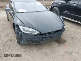 2017 Tesla Model S 100D z VIN 5YJSA1E27HF208282, wystawiony jako IAAI lot #41362736 z przebiegiem 173 162 mil mil oraz . Historia ofert i sprzedaży dostępna na DreamBid. Obrazek 6.